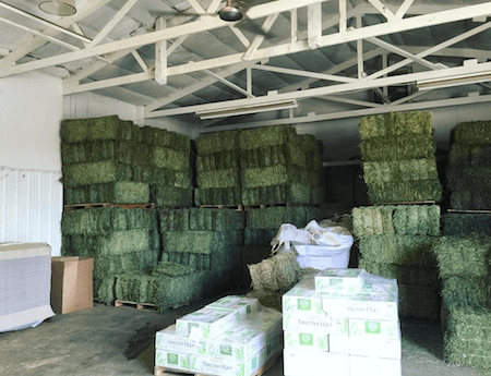 stacks of small pet select premium hay